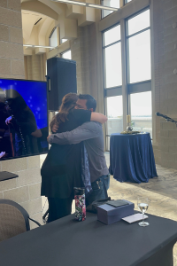 Tara and Paul hug