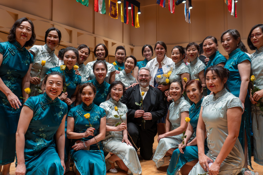 Anderson is surrounded by choir members from a Seattle choir.