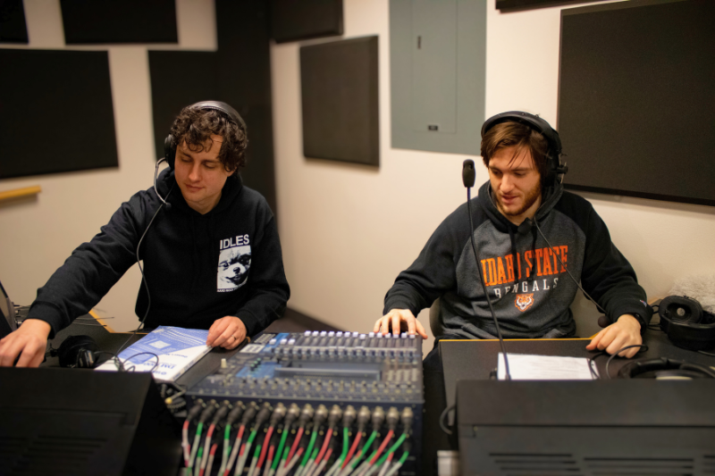 two students use sound boards