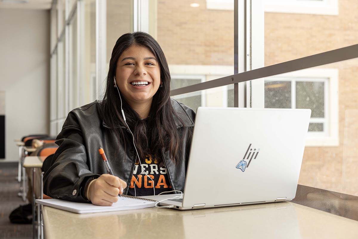 Student working at computer in the SUB