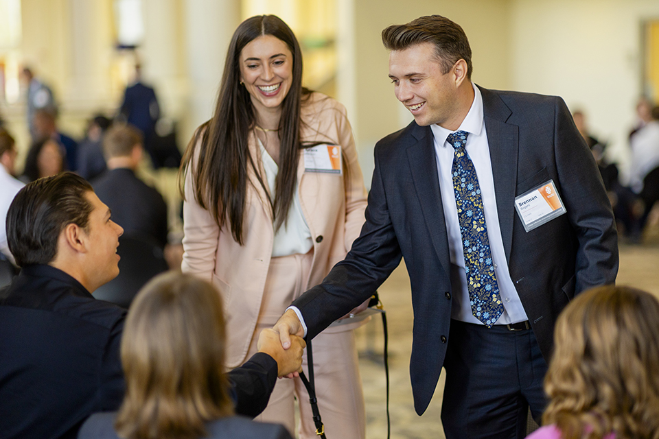 Students and professionals networking at Accounting Symposium