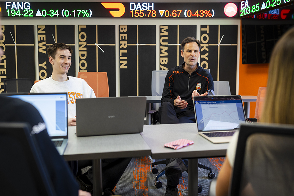 Students working with a professor
