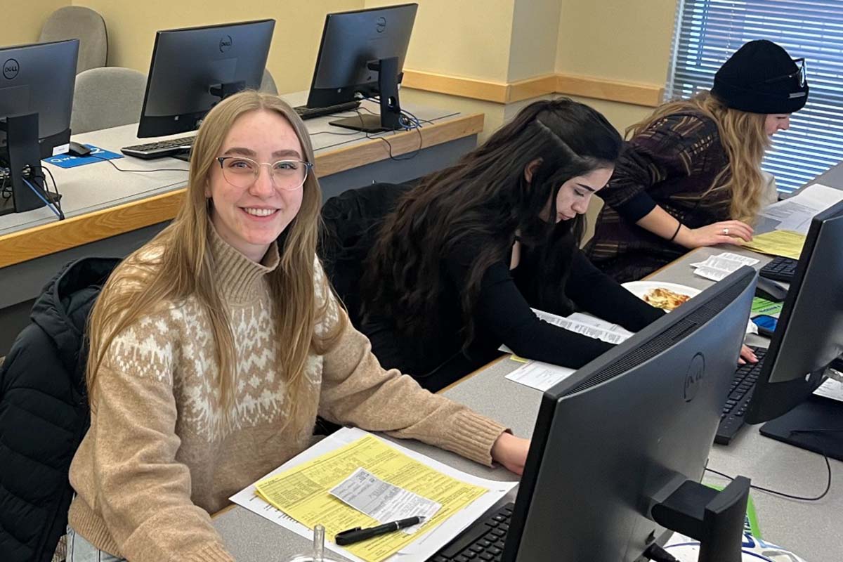 Students working on tax documents during a VITA session