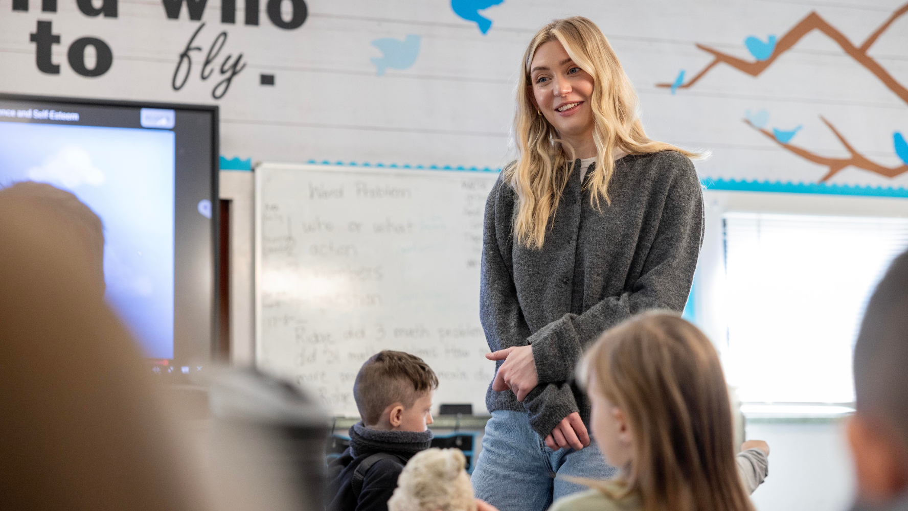Student teacher in a classroom full of kids