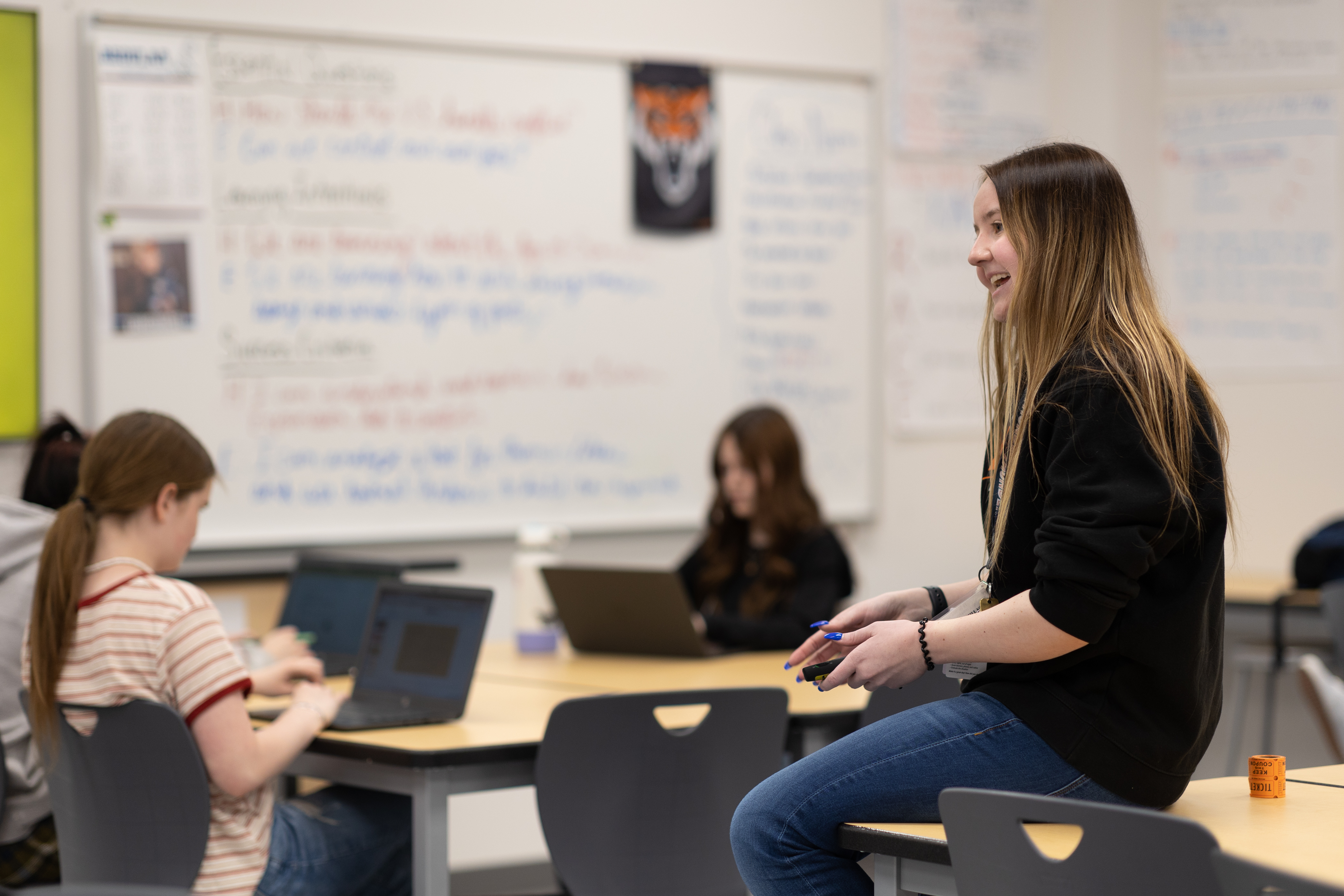 Alumni teaching in their classroom
