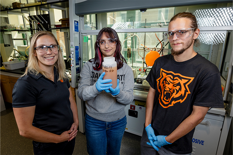 From left, Cori Jenkins, associate professor of chemistry, and students Kira Torrez and Angelo Mayer pose for a photo in a lab in Leonard Hall on ISU’s Pocatello campus.