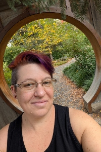 Heather Studley selfie in front of a hobbit-like archway