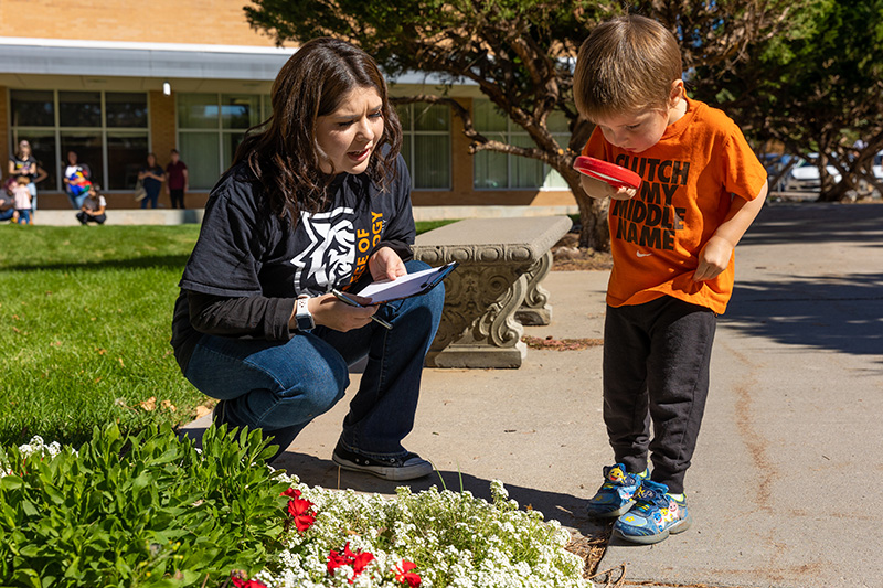 Early Childhood Care and Education student working with a child