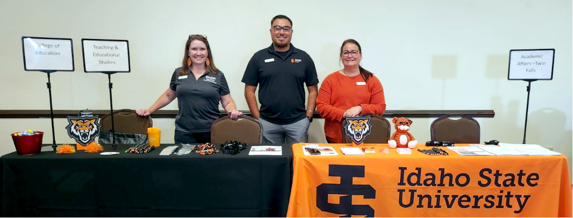 ISU Twin Falls employees standing at recruitment table