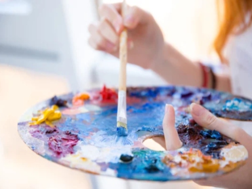Paint and paintbrush.