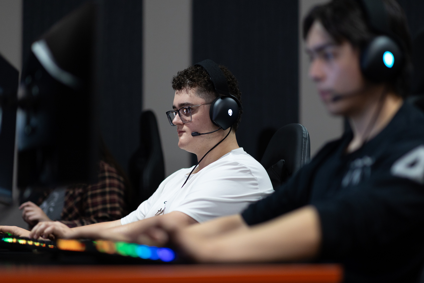 A man sits at a computer