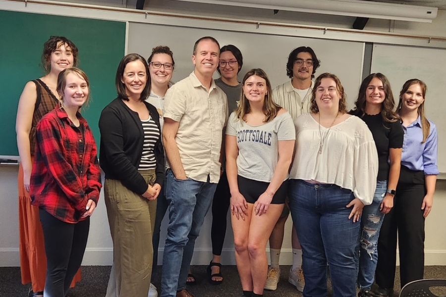 Nate Eaton with ISU students in an anthropology class