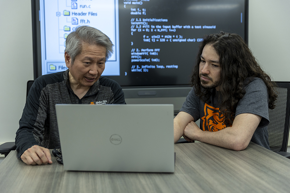 Steve Chiu, professor and chair of the computer science department, and Teo Hanson, ISU student, pose for a photo on Idaho State University’s Pocatello campus.