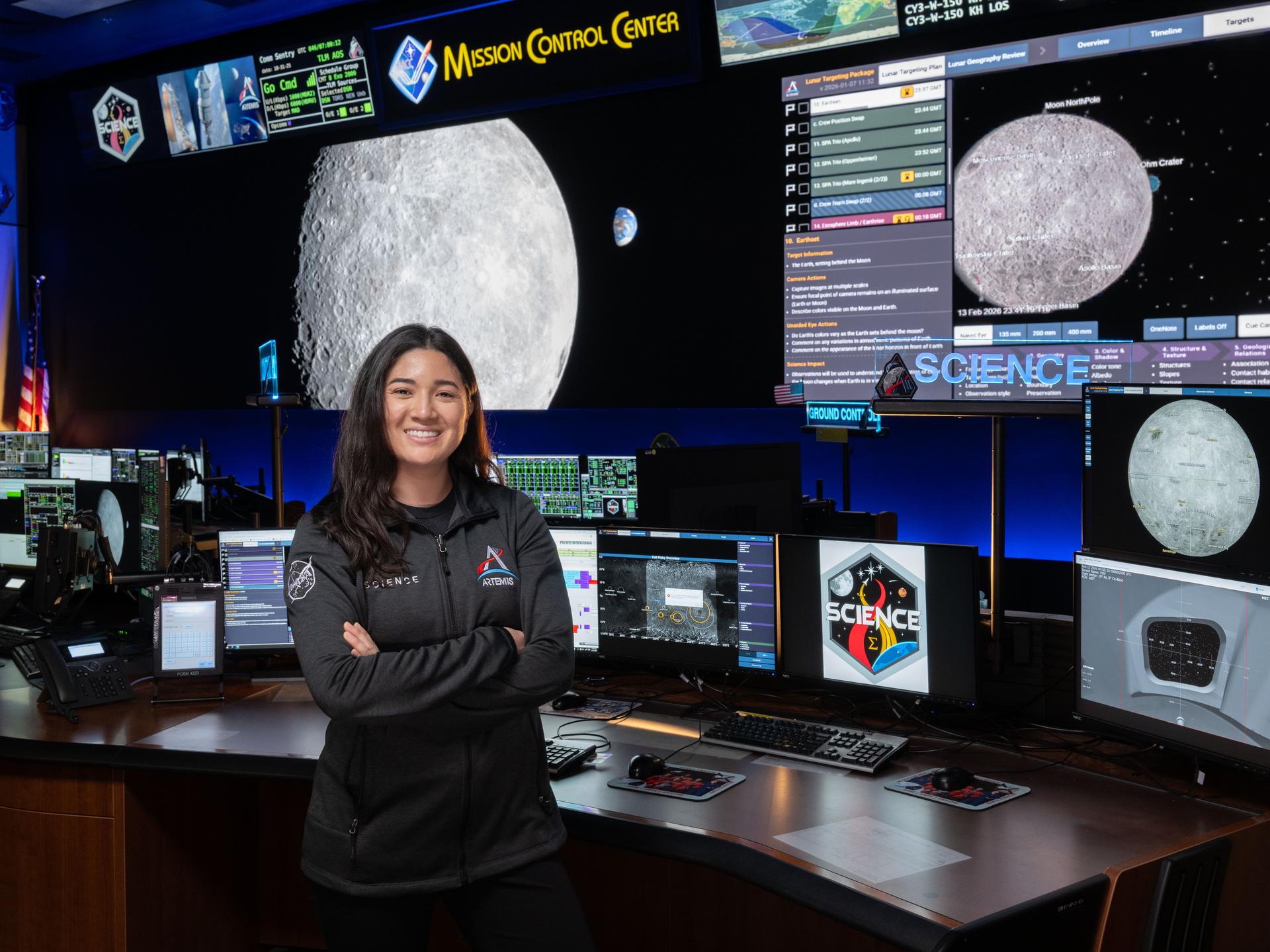 Artemis science officer, Angela Garcia, stands at the new SCIENCE console in the Mission Control Center at NASA’s Johnson Space Center in Houston.