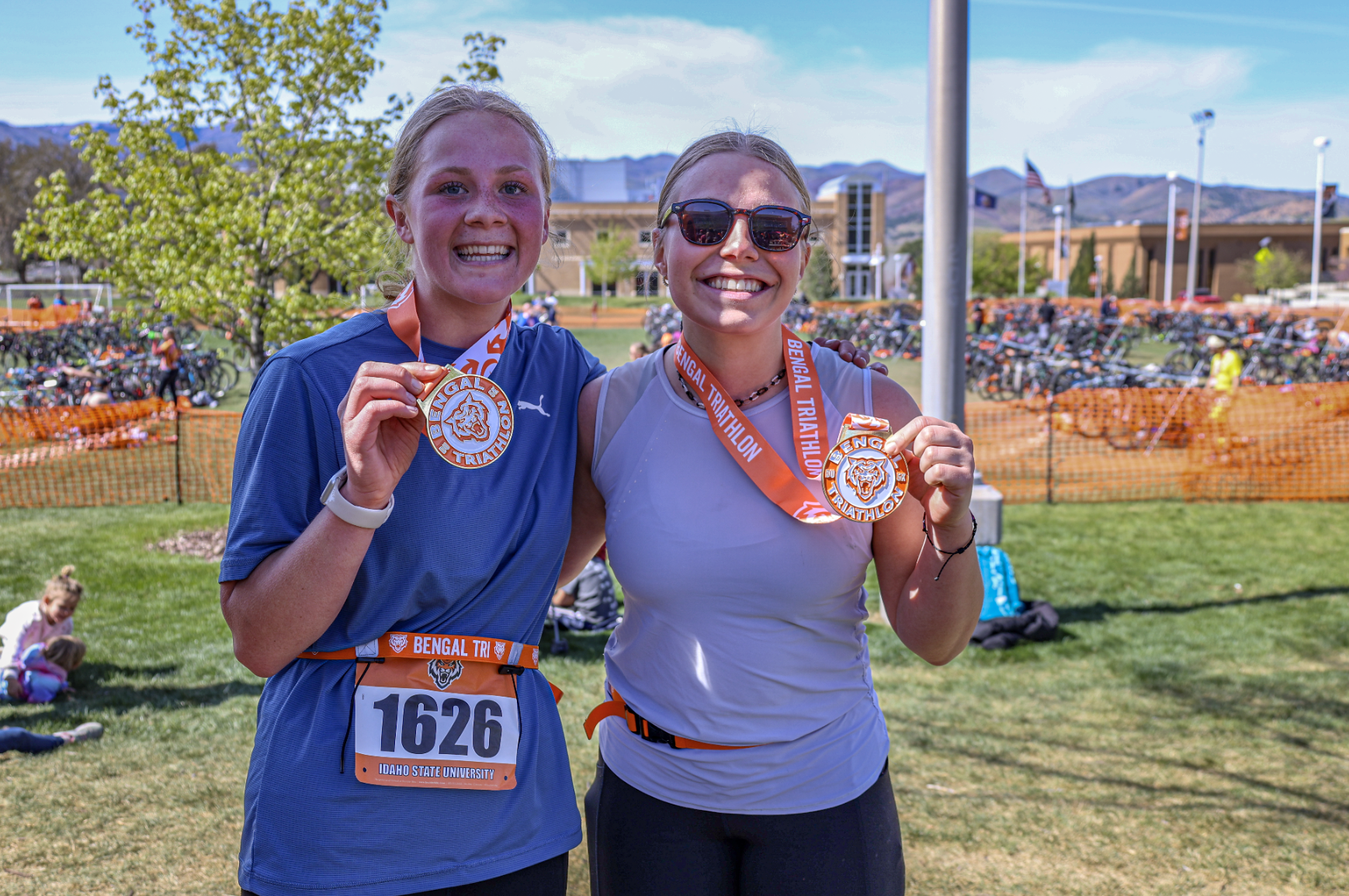 Bengal Triathlon participants show off their medals